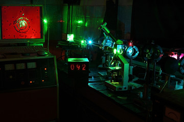 Movement of microparticles by laser in dark lab with timer