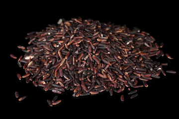 Black rice isolated on black