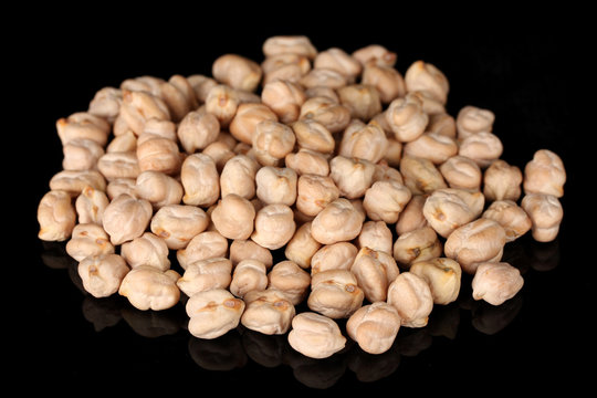 White chickpeas isolated on black
