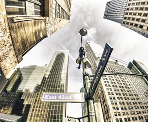 Fotobehang Onderaanzicht van wolkenkrabbers in New York © jovannig