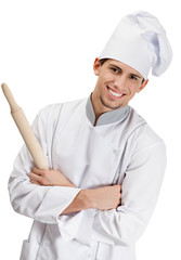 Chef cook in uniform hands wooden rolling pin, isolated on white