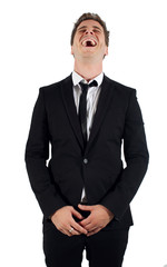 homme d'affaire en plein fou rire