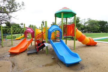 Complex playground set in well-maintained park