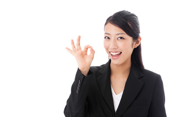 asian businesswoman showing okay sign on white background