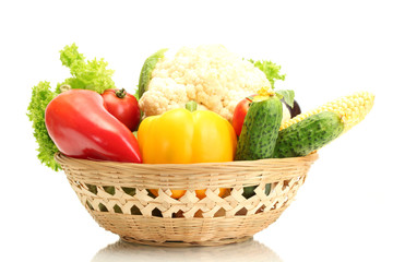 Fresh vegetables in basket isolated on white