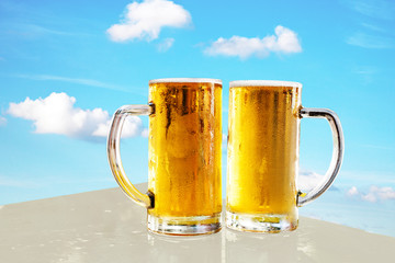 Two glasses full of fresh beer