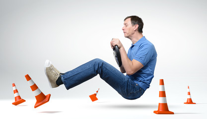 Funny novice man car driver with a wheel, concept