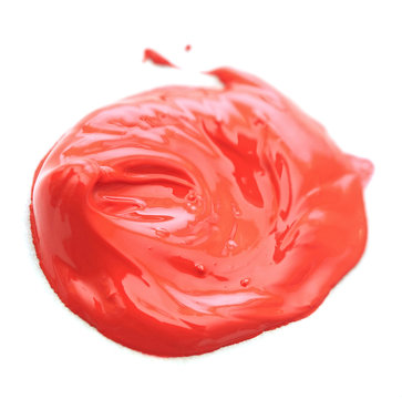 red paint blob on white background