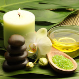 oil and orchid with green leaf