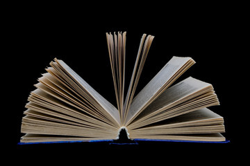 open book on a black background