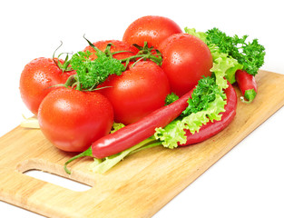 Composition with raw vegetables on kitchen table