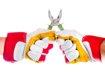 gloved hand with pliers