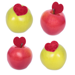 Set of apple with a heart symbol against white background