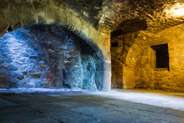 Warm and cold light in stone chamber