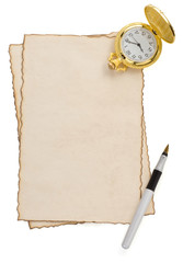 ink pen and watch at parchment on white