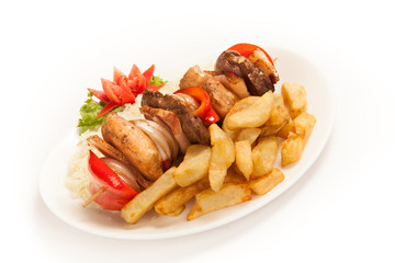 Skewers with rice and french fries