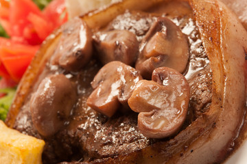 Filet Mignon with rice and french fries close up