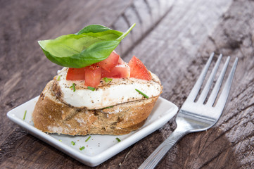Piece of Mozzarella Cheese on a baguette
