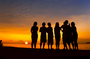 silhouette people on sunset