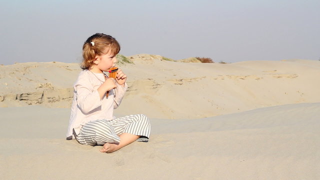 little girl play panpipe