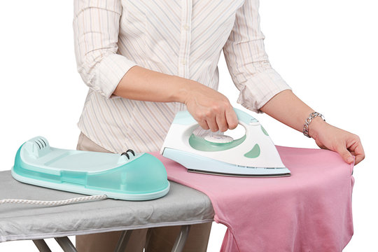 A woman ironing her cloth isolated