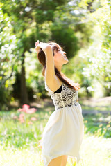 Beautiful young woman in the forest