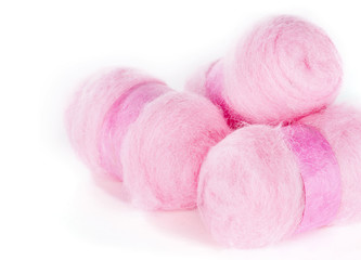 Fototapeta na wymiar Balls of pink wool
