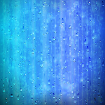 Blue rainy window background with drops and blur © Nadezda Kostina
