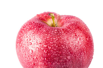 Wet red apple isolated on white