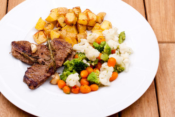grilled steak and vegetables