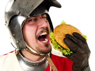 medieval knight eating a tasty hamburger