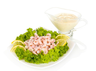 Delicious marinated shrimp in plate isolated on white