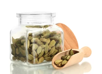 Foto op Canvas Jar of cardamom isolated on white close-up © Africa Studio