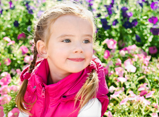 Outdoor portrait of cute little girl