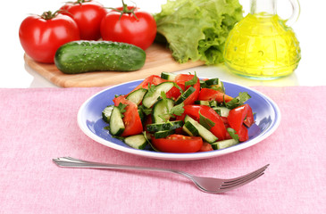 Fresh salad with tomatoes and cucumbers