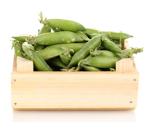 Green peas in crate isolated on white
