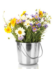 beautiful bouquet of bright  wildflowers in bucket, isolated
