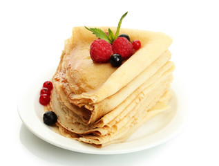 Delicious pancakes with berries and honey