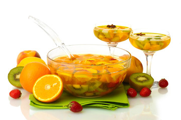 punch in bowl and glasses with fruits,