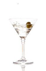 Martini glass with olive isolated on white