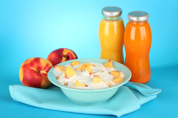 tasty dieting food and bottles of juice, on blue background