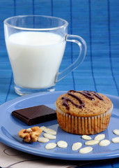 Muffin cake, milk and chocolate