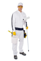 painter in white overalls holding paint brush bucket on a white