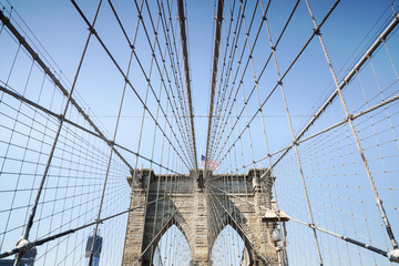 Naklejka premium Brooklyn Bridge with American Flag
