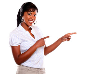 Young female wearing a headphones looking at you