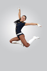 Young female dancer against white background