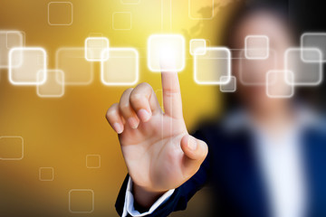 hand of business women pushing a button on a touch screen interf