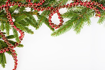 Christmas frame with conifer and red garland