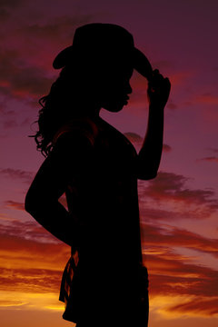 woman silhouette hat western