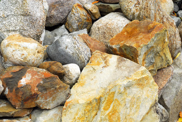 Close-up of different large rocks in pile.